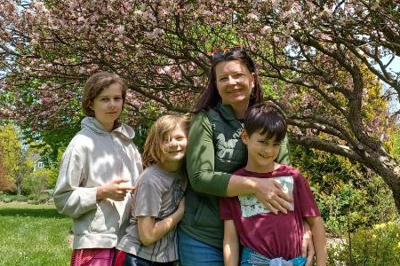 Elaine with her three kids.